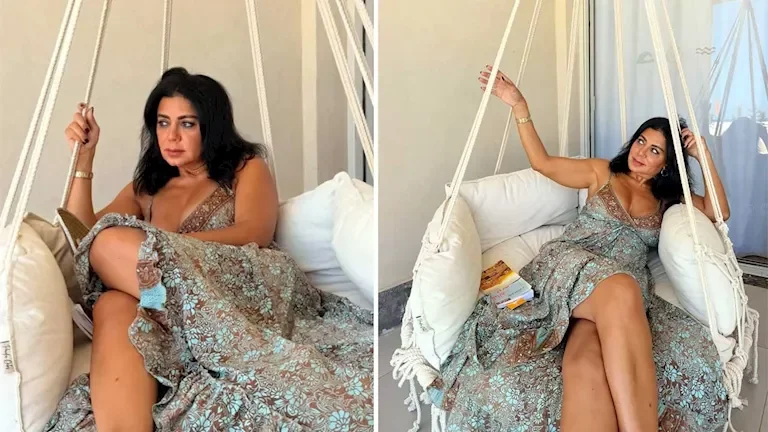 رانيا يوسف تتألق بفستان جريء أثناء جلوسها على المرجيحة والجمهور يتفاعل - صور