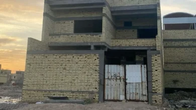 موظف عراقي يحتاج إلى ربع قرن من الادخار لشراء منزل صغير في أطراف المدن amid أزمة السكن